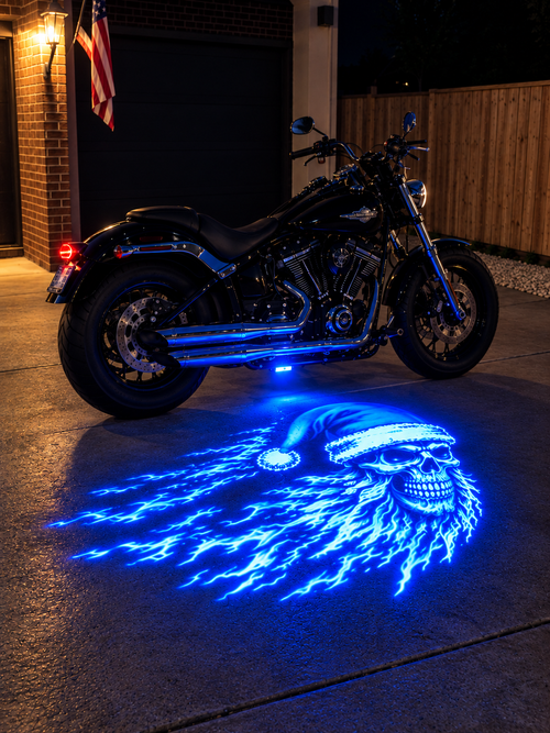 Blue Santa skull projection under a motorcycle at night